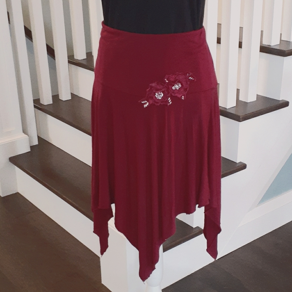 & Le Chateau flirty handkerchief hem skirt